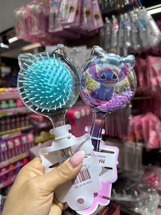 Escova de cabelo stitch