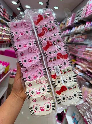 Presilha hello kitty oculos c/12