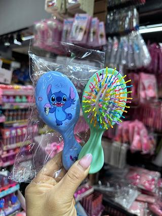 Escova de cabelo stitch