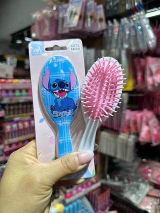 Escova de cabelo stitch
