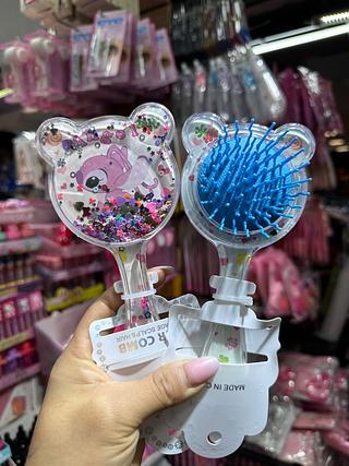 Escova de cabelo stitch